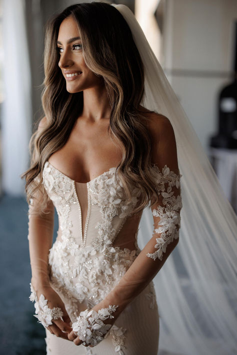 This form-fitting mermaid gown, made of 3D sparkly lace, features a cinched waist corset top and a dramatic cutout that continues to the back with a dramatic semi-sheer train. Nadia also includes glamorous and embellished off-the-shoulder gloves. #weddingdress #bridalgoals #bride Photography & video | Louis Gabriel Photography Corset Style Wedding Dress, Baby Dress Embroidery, Top Wedding Trends, Hairdo Wedding, Waist Corset, Couture Wedding Gowns, Galia Lahav, Bride Photography, Dream Wedding Ideas Dresses