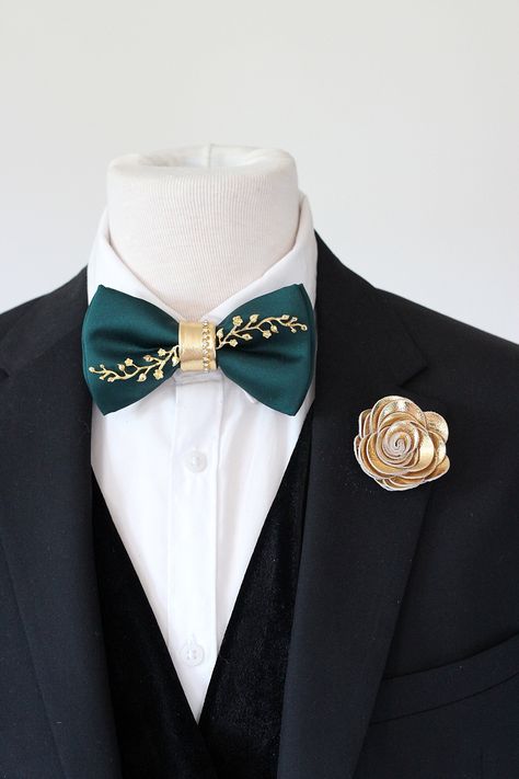 Emerald green satin mens tuxedo bow tie, emerald green bowties men, gold boutonniere lapel flower teal wedding, groom gift set, groomsmen by Nevestica on Etsy Emerald And Gold Wedding Party, Emerald Green Dress Gold Accessories, Emerald Green And Gold Wedding Dress, Wedding Suit Green Tie, Emerald Green Wedding Theme Groomsmen, Emerald Green Navy Blue And Gold Wedding, Emerald And Gold Quince Theme, Teal Green And Gold Wedding, Emerald Green Tuxedo Wedding