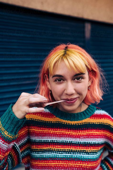 Cute portrait of a young Gen Z woman with colored hair chewing strawberry gum and looking at camera. Gen Z Portrait, Strawberry Gum, Cute Portrait, Colored Hair, Gen Z, Wide Angle, Bubble Gum, Stuff To Do, Cool Girl