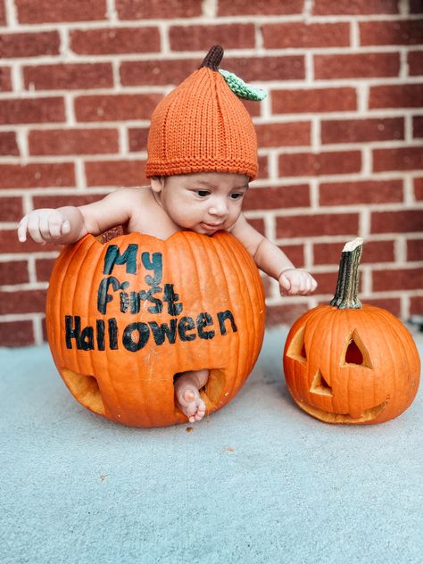 Infant In Pumpkin Picture, Pumpkin Baby Halloween Costume, Baby Boy Halloween Photo Shoot Ideas, Newborn Pumpkin Photoshoot, Baby Inside Pumpkin Pictures, Newborn In Pumpkin, Bumpkin Pics Baby, Pumpkin Pictures Baby, Fall Photoshoot For Baby