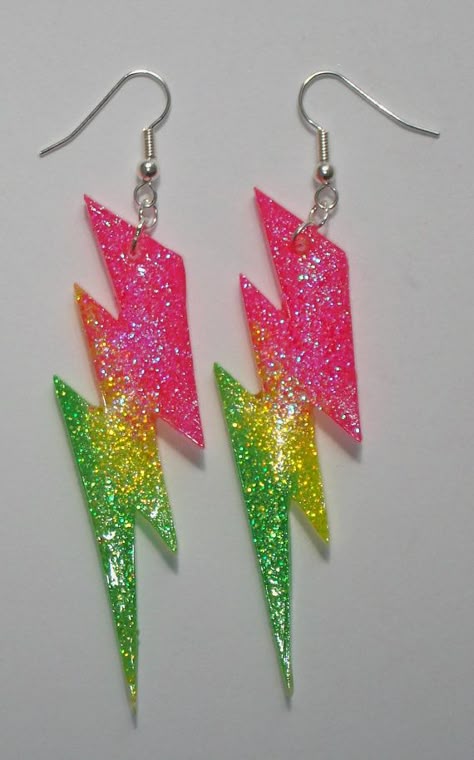 AMAZING neon rainbow lightning resin earrings. LOVE these!!! Rainbow Lightning, 80s Accessories, 80s Jewelry, 80s Theme, Jem And The Holograms, Funky Earrings, Neon Rainbow, Resin Earrings, Fun Earrings