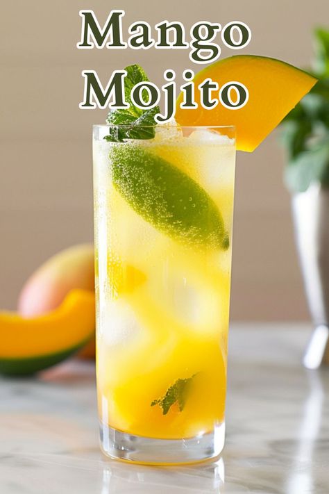 A Mango Mojito is a refreshing cocktail that combines the tropical sweetness of mango with the classic minty and citrus flavors of a traditional mojito. It is made with simple syrup, fresh mint, lime juice, rum, mango nectar, and topped with club soda. Mango Mojito Recipe, Summer Rum Cocktails, Dark Rum Cocktails, Rum Cocktails Easy, Cocktails To Make At Home, Mango Mojito, Rum Cocktail Recipes, Refreshing Cocktail, Mojito Recipe