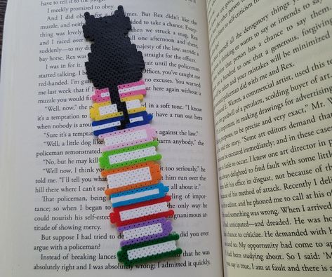 A super cute cat bookmark to add style to your reading! Made with mini perler beads The bookmark is made from soft and flexible beads that were melted together Bookmark Size: Approximately  15 cm by 3cm (Approximately 6 inches by 1.25 inches) All of my items are handmade. Each one is unique and might not be exactly the same as shown on photos. Please keep away from heat for long periods of time. Have a specific bookmark you want? Feel free to send me a message!  If you have ANY questions or concerns please contact me! Perler Beads Bookmark, Cat Perler Beads, Beads Bookmark, Mini Perler Beads, School Bookmarks, Perler Beads Ideas, Easy Perler Beads Ideas, Beyond Borders, Diy Perler Bead Crafts