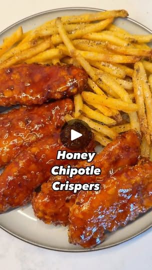 27K views · 285 reactions | @doosifit HIGH PROTEIN, LOW CALORIE version of the viral honey chipotle chicken crispers 🍯🌶️🤤

Servings: 4 servings or 8 tenders
Serving size: 2 tenders

Macros (2 large tenders) ⬇️
346 calories 
52g protein
26g carb
4g fat

Chicken marinade (8 tenders) ⬇️
1.5 lb chicken breast tenders
1/4 cup egg whites 
1 tsp salt
1 tsp paprika
1 tsp garlic powder

Breading (8 tenders) ⬇️
64g cheese protein chips (quest, atkins, etc)
42g corn flakes
1/4 cup flour
1 tbsp baking powder

➡️ air fryer 375 degrees, 12-16 minutes

Honey chipotle glaze ⬇️
2 tbsp honey
2 tbsp chipotle adobo sauce
(Optional) 2 tsp garlic paste
(Optional for extra spiciness) blend in 1-2 chipotle adobo peppers

#crispers #tenders #chickentenders #chicken #honeychicken #chilis #easyrecipe #macrofriend Chipotle Chicken Crispers, Honey Chipotle Chicken Crispers, Adobo Peppers, Chipotle Adobo Sauce, Chipotle Glaze, Chipotle Adobo, Chicken Breast Tenders, Chicken Crispers, Honey Chipotle Chicken