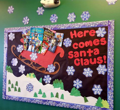 Santa Bulletin Board. "Here comes Santa Claus!" Santa's sleigh filled with 'gift wrapped' book covers. Santa Bulletin Board Ideas, Santa Sleigh Bulletin Board, Bulletin Board Ideas For Libraries, Christmas Charts For School, Kindergarten Christmas Bulletin Board, Santa Bulletin Board, Christmas Board Decoration, Christmas Bulletin Board Ideas, Toddler Bulletin Boards