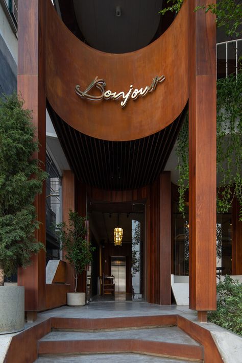 Bonjour Cafe / Comma Studio | ArchDaily Library Cafe, Brutalist Buildings, Hotel Entrance, Facade Lighting, Entrance Design, Building Exterior, Facade Architecture, Shop Ideas, Facade Design