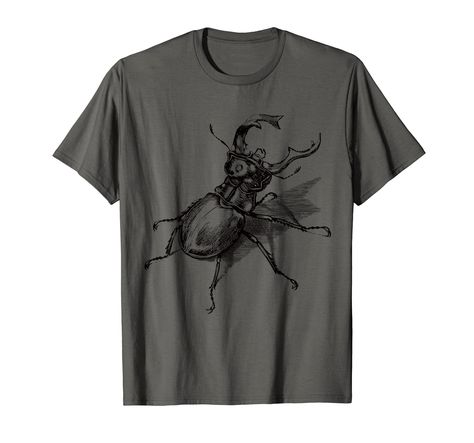 PRICES MAY VARY. Scientific illustration of a beetle in black and white hand drawn ink drawing. Perfect gift for anyone who loves classical arts, handdrawn graphic sketches, bugs and nature. Vintage style artistic insect print will make a great present for nature and wildlife fans. Will fit with grunge, minimalist and retro outfits. Biology and entomology theme. Symbol of stability, reliable, recycling and strength Lightweight, Classic fit, Double-needle sleeve and bottom hem Beetle Scientific Illustration, Insect Outfit, Grunge Minimalist, Insect Print, Stag Beetle, Scientific Illustration, Classical Art, Retro Outfits, Buy Vintage