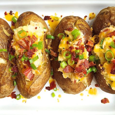 Loaded Baked Potatoes with Bacon and CheddarDelish Stuffed Spuds, Broke Meals, Dinner Ides, Bake Potato, Cheddar Recipes, Potatoes With Bacon, Potato Bake, Cheap Recipes, Cheesy Potato