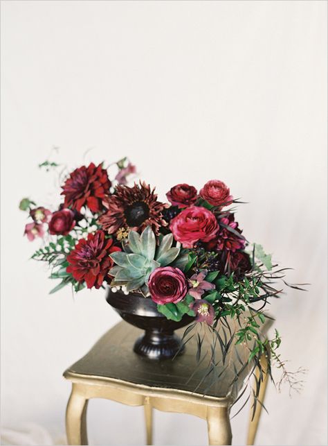 dark and dramatic wedding flowers,mix of hybrid black baccarra roses, burgundy dahlias, wine colored anenomes, and black sunflowers. Accented with playful purple ranunculus, hellebores, clematis, and burgundy scabiosa buds. Then finished with chocolate Geranium, a succulent, and several types of Eucalyptus to add a whimsical feel. Fun Floral Arrangements, Pantone 2015, Romantic Wedding Centerpieces, Burgundy Dahlia, Marsala Wedding, Dark Wedding, Unique Wedding Venues, Mod Wedding, Fall Centerpiece