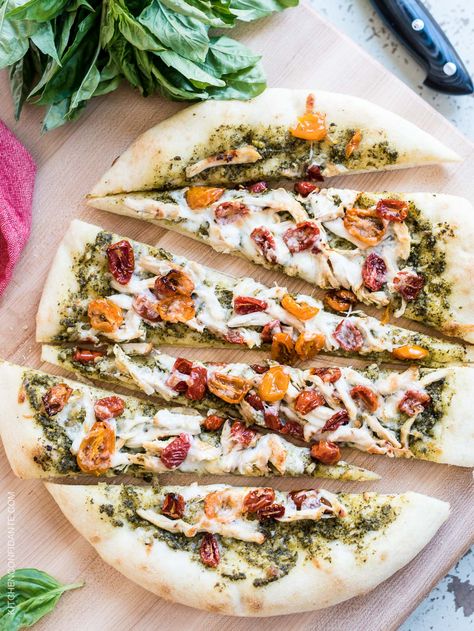 Chicken Pesto Pizza bakes in a snap, thanks to freezer-friendly shortcuts! Keep a batch of pizza dough and toppings in the freezer, and dinner is ready in minutes. You can even prep and freeze the whole pizza for the busiest of weeknights! Recipes Using Pesto, Chicken Pesto Pizza, Pesto Pizza Recipe, Chicken Pesto, Pizza Kitchen, Pesto Pizza, European Recipes, Family Dinner Recipes, Pizza Night