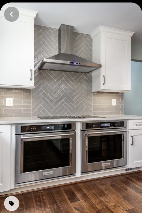 Kitchen Backsplash Around Hood, 2 Backsplashes In Kitchen, White And Grey Herringbone Backsplash, Stove Wall Backsplash, Herringbone Tile Behind Stove, Kitchen Backsplash Behind Range, Backsplash Above Stove Ideas, Behind Oven Backsplash, Herringbone Backsplash Behind Stove