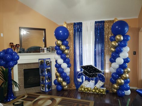 Blue white and chrome gold Blue And Gold Grad Party Ideas, Blue Black And Gold Graduation Party, Royal Blue And White Balloon Arch, Graduation Party Ideas Blue And Yellow, Blue And Gold Prom Decorations, Blue And Gold Backdrop Ideas, Graduation Party Blue And Gold, Blue And Gold Graduation Party Decor, College Send Off Party Ideas