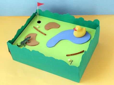 Cereal Box Mini Golf: We're not quite sure which is more fun with this kids craft, making or playing? #craft #cardboard Cereal Boxes Diy, Cereal Box Craft, Golf Crafts, Golf Diy, Golf School, Outdoor Games For Kids, Miniature Golf, Diy Games, Mini Golf