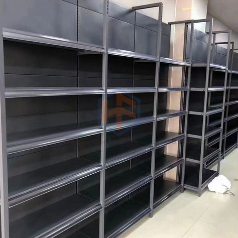 Medium-duty racks are utilized in retail stores and supermarkets for displaying and organizing merchandise. They are commonly used in backrooms or storage areas to store and access inventory easily. Medium-duty racks provide a cost-effective and flexible solution for retail spaces, allowing for easy restocking and inventory rotation. #storagesolutions #organizationaltools #warehouseracks #industrialstorage #durablestorage #shelvingsystems #retailstorage #garageorganization Side Shelves, Modern Store, Supermarket Shelves, Store Layout, Industrial Storage, Shelving Systems, How To Remove Rust, Product Display, Storage Area