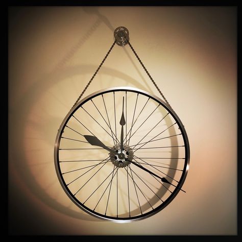 I love the shadow this Hanging Bike Wheel Clock casts when the light hits it. makes all of the work it takes to make these so worthwhile! Bike Wheel Art, Diy Wood Wall Decor, Bicycle Clock, Recycled Bike Parts, Wheel Clock, Theater Decor, Tire Art, Beaverton Oregon, Movie Decor