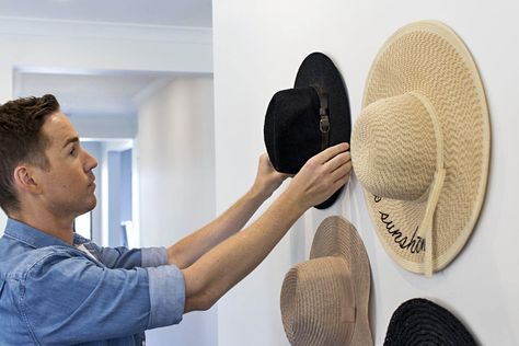 diy hat wall using 3m hooks by chris carroll tlc interiors Cowboy Hats On Wall, Cowboy Hat Hooks, Hats On Wall, Hat Hooks Wall, Cowboy Hat Wall, Hat Wall, Floppy Hats, Hat Hooks, Diy Hat