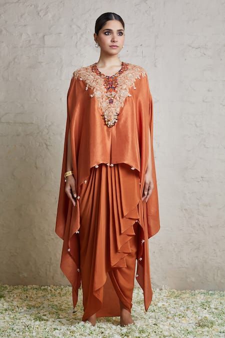 Buy Orange Kaftan Silk Embroidered Dori V Neckline And Dhoti Skirt Set For Women by Prisho Online at Aza Fashions. Orange Kaftan, Rust Orange Dress, Dhoti Skirt, Om Ganesh, Kaftan Pattern, Payal Singhal, Mehendi Outfits, Pearl Embroidery, Latest Dress Design