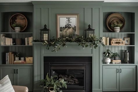 Discover 50+ inspiring ideas for stunning fireplace built-ins. Elevate your space with these tips on decor, color palettes, and designs. Fireplace Surround Built Ins, Wall And Fireplace Same Colour, Green Fireplace Living Room, Green Fireplace And Built Ins, Bookshelves On Sides Of Fireplace, Dark Mantle Decor, Blue Built In Bookcase Fireplace, Coloured Fireplace Surround, Family Room With Built Ins