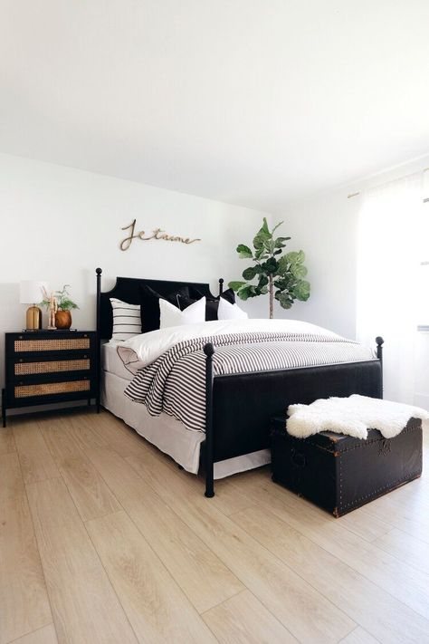 All White Bedroom With Black Accents, Rugs In Bedroom Black And White, Black Cane Nightstand Bedroom, Bedroom With Black And Gold Accents, Black Cane Nightstand, Modern Bedroom With Black Furniture, White With Black Accents Bedroom, Simple Black Bedroom Ideas, Bedrooms With One Nightstand