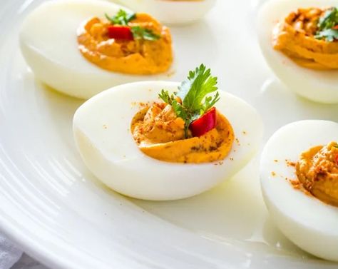 Thai Red Curry Deviled Eggs Recipe | SideChef Curry Deviled Eggs Recipe, Pumpkin Deviled Eggs, Thanksgiving Deviled Eggs, Healthy Deviled Eggs, Southern Deviled Eggs, Guacamole Deviled Eggs, Deviled Eggs Recipe Easy, Devilled Eggs Recipe Best, Deviled Eggs Recipe Classic