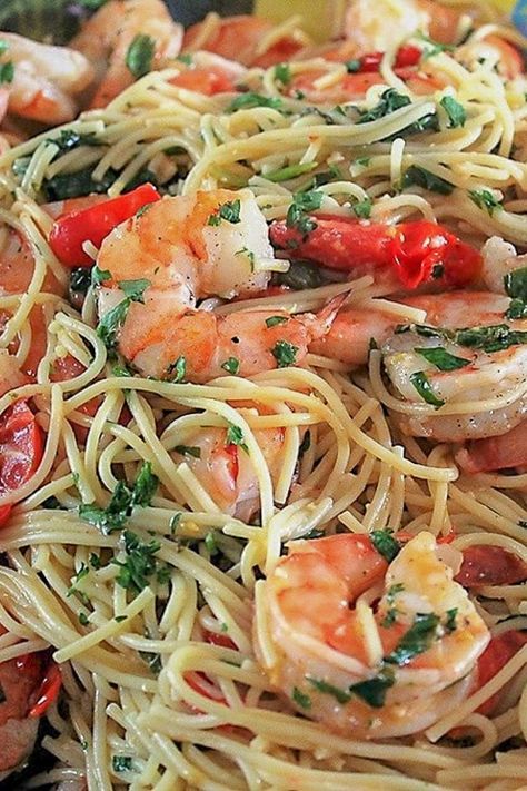 This Lemon Pasta with Shrimp is out of this world.  The lemon shines through, the capers and garlic give it extra oomph and the butter makes it rich and silky. Seriously good! #shrimppastarecipe Lemon Pasta With Shrimp, Sauté Shrimp, Lemon Shrimp Pasta, Pasta With Shrimp, Prawns Recipe, Prawn Dishes, Lemon Shrimp, Shrimp Recipes For Dinner, Lemon Pasta