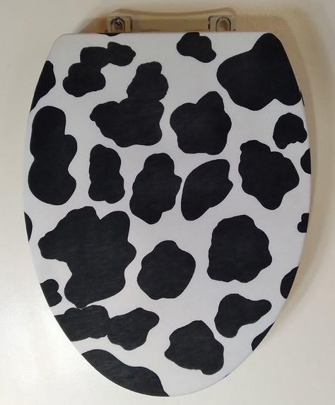 "Toilet Seat Covers : Inexpensive bathroom remodel idea.  Black and white splat. Holstein cow look. Farm home decor Small bathroom idea Fun Decorating ideas Cloth Toilet Seat Lid Cover. Cotton blend stretch material. For elongated toilet lids 14-15\" wide x 17-20\" long." Cow Themed Bathroom Ideas, Toilet Covers Ideas, Cow Bathroom, Toilet Seat Lid Covers, Fun Toilet, Toilet Seat Lid Cover, Inexpensive Bathroom Remodel, Eco Friendly Toilet, Painting Bathtub