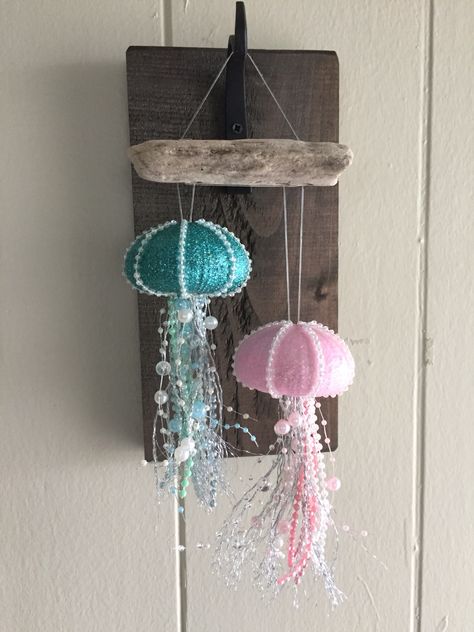 Dual jellyfish Christmas ornaments made from sea urchin shells and driftwood. Sea Urchin Jellyfish Ornament Diy, Sea Urchin Jellyfish, Sea Urchin Shell Crafts, Sea Urchin Craft, Urchin Art, Sea Urchins Art, Jellyfish Ornament, Sea Urchin Shells, Sea Life Decor