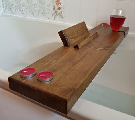 Dimensions of bath caddy (without book/tablet stand) : 70cm x 16cm x 4cm (27,5" x 6,3" x 1,6").The caddy is:- made from 100% solid natural wood,- finished by varnish, which gives the wood a satin finish,- resistant to contact with water.All products are made by me, feel free to shopping! Wooden Kitchen Bench, Bathtub Shelf, Diy Bathtub, Tub Tray, Bath Board, Bathtub Caddy, Bath Table, Bath Shelf, Bathtub Decor