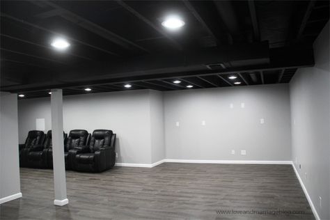 Our Painted Basement Ceiling - Love and Marriage Basement With Black Painted Ceiling, Matte Black Basement Ceiling, Basement Color Schemes With Black Ceiling, Matte Black Ceiling, Garage Black Ceiling, Black Sprayed Ceiling Basement, Basement With Black Ceiling, Black Basement Walls, Black Ceiling Basement