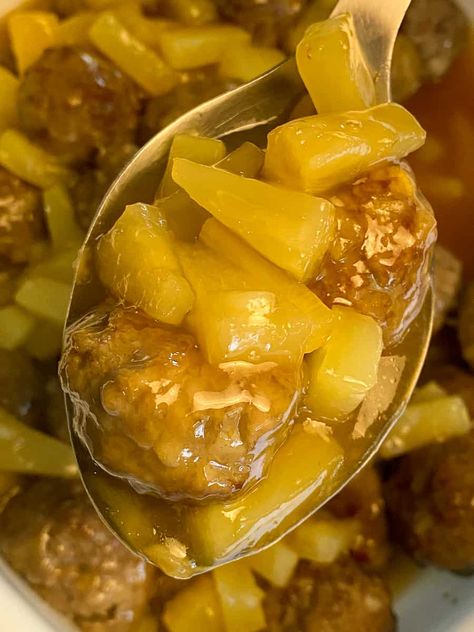 Pineapple sweet and sour glaze on serving spoon with Polynesian Meatballs Polynesian Meatballs, Easy Sweet And Sour Meatballs, Sweet And Sour Meatballs Recipe, Sweet Sour Meatballs, Pineapple Meatballs, Hawaiian Meatballs, Pineapple Tidbits, Tender Meatballs, Grape Jelly Meatballs