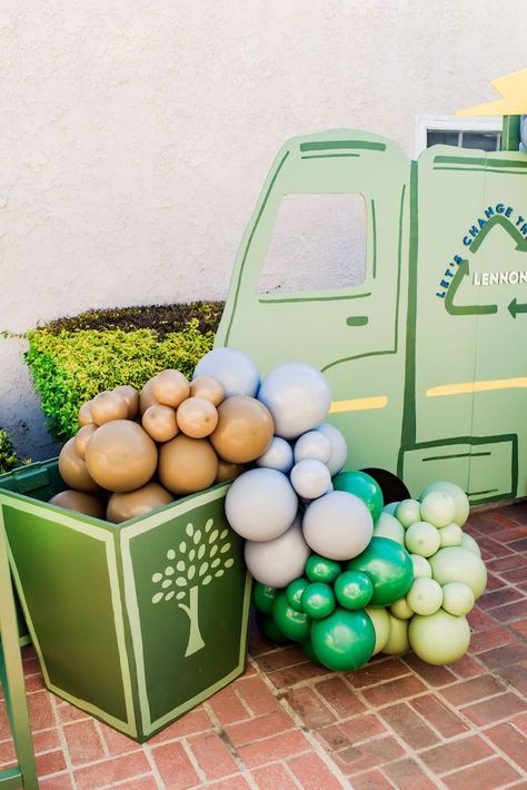 Kara's Party Ideas Recycling + Trash Truck Party | Kara's Party Ideas Sustainable Birthday Party Ideas, Recycling Party Theme, Trash Truck Balloon Garland, Recycling Birthday Party Ideas, Recycling Party Ideas, Trash Birthday Party, Garbage Truck Balloon Garland, Trash Bash, Trash Truck Party