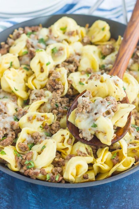 This Cheesy Beef Tortellini Skillet is a simple, one pan meal that's bursting with flavor. Loaded with ground beef, spices, tortellini, and cheese, this easy meal is family-friendly and so delicious! #beef #beefskillet #beeftortellini #tortellini #tortelliniskillet #easydinner #skilletdinner #dinner Cheesy Beef Tortellini, Beef Tortellini, Tortellini Skillet, Cheese Tortellini Recipes, Cooking Blogs, Resep Pasta, One Pan Meal, Tortellini Recipes, Pasta Dinners