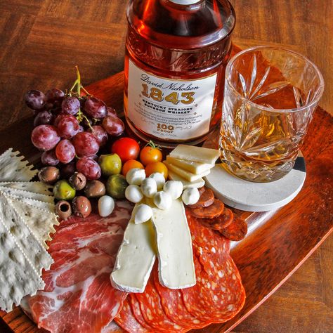 Who doesn't love a charcuterie board? Meat, cheese, tasty accompaniments like olives and crackers — what more could you need? Well … you could add a side of bourbon. While charcuterie boards are quite often paired with favorite wines, if you’re a whiskey fan, you may be wondering how you can pair th Charcuterie Board Meats, Wheated Bourbon, Christmas Cookie Cake, Bourbon Tasting, Rye Bourbon, Raw Nuts, Chocolate Bourbon, A Charcuterie Board, Cheese Pairings