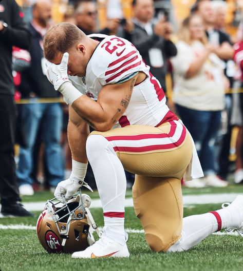 Christian McCaffery # 23 RB praying before the game vs. the Pittsburgh Steelers rushing for a game-high 152 yards in the 49ers win 30-7 on 9/10/2023 Christan Mccaffery Niners, Christian Mccaffrey 49ers, Christian Mccaffrey Wallpaper, Jeremy Shockey, Football Studs, Football America, 49ers Quarterback, Football Drip, 49ers Players