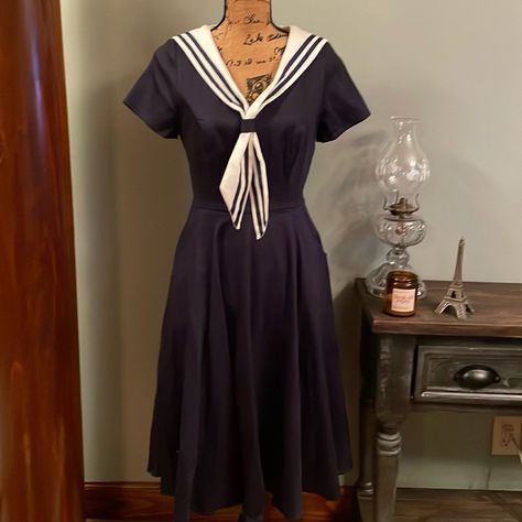 Navy Blue Sailor Collectif Dress. Collar Is Removable, With A Back Zip. Two Hip Deep Pockets. Size Small. Chest 17” Waist 13.5” Hips 26.5” Length 52.5” New With Tag. Purchased In Whitby, England. 98% Cotton 2% Elastane. Machine Wash. Sailor Dress Women, Whitby England, Sailor Blouse, 2024 Wishlist, Vintage Sailor, Dress Collar, Sailor Fashion, Sailor Dress, Sailor Collar