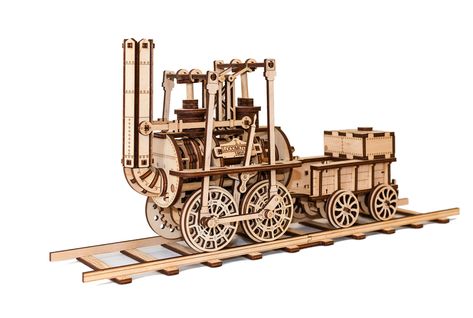 Historical locomotion model by EWA - LOCOMOTION #1! The first train in EWA’s range! 🚂 History on your hand - the model based on a real locomotive made in 1825. 🚂 Rubber-band engine - no metal, no coal, just wood, rubbers and your hands for assembling. 🚂 Crank mechanism - real mechanics in action! 🚂 Wooden railway stopper - easy to ride, easy to put on the shelf. Model Steam Trains, Mechanical Puzzle, Wooden Model Kits, Mechanical Model, Laser Cut Plywood, Stem Kits, Quality Family Time, 3d Modelle, Wooden Jigsaw Puzzles