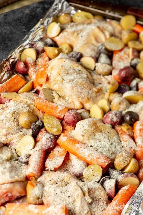 Ranch Chicken with Carrots and Potatoes is an easy weeknight meal you can prepare in 10 minutes.  A slightly sweet variation on baked chicken that everyone will love. #butterandbaggage #easydinner #10minutetuesday #chicken #1pandinner Baked Chicken And Carrots, Ranch Chicken And Potatoes In Oven, Chicken Potato And Carrots Baked, Baked Chicken Potatoes And Carrots, Chicken Carrots Potatoes Oven, Sheet Pan Chicken And Potatoes, Chicken Potatoes Carrots, Recipe With Carrots, Baked Chicken Tenderloins