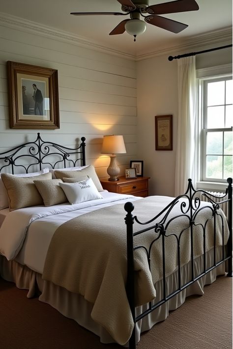 Rustic farmhouse bedroom with vintage quilts and wooden dresser Iron Beds Bedroom Decorating Ideas Master, Cottage Bedroom Iron Bed, Black Rot Iron Bedroom, Antique Mirror Above Bed, Metal Bed Frame Bedroom Ideas Vintage, Iron Bed Frame Bedroom, Wrought Iron Bedroom Ideas, Black Metal Bed Frame Bedroom Ideas, Iron Beds Bedroom Decorating Ideas