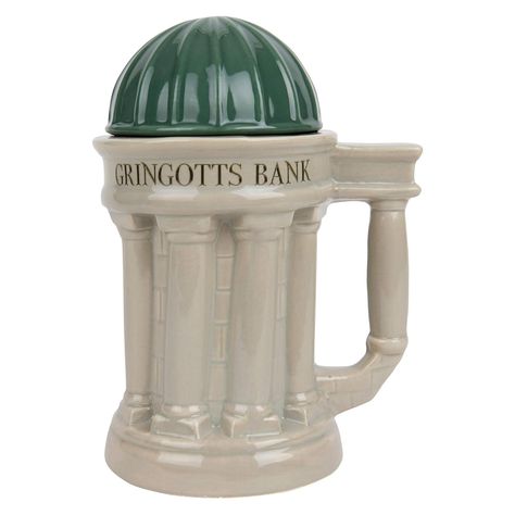 PRICES MAY VARY. Make your morning coffee a magical experience with this Harry Potter ceramic lidded mug featuring Gringotts Bank from the Harry Potter wizarding world! Fill up this Harry Potter lidded mug with coffee to magically turn yourself into a morning person once a day. Also great for tea, hot chocolate, butterbeer, pumpkin juice and more! The lid helps keep your drink hot and prevents spilling. This large 30 oz novelty mug can also be used as a beer stein, decoration or as storage for c Harry Potter Gringotts Bank, Harry Potter Gringotts, Hot Butterbeer, Gringotts Bank, Harry Potter Wizarding World, Rubeus Hagrid, Pumpkin Juice, Disney Coffee Mugs, Harry Potter Merchandise