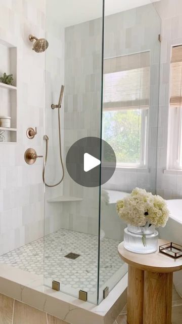 Bedrosians Tile on Instagram: "From outdated and drab to bright and airy, this new white bathroom with herringbone wood floors and a sleek white tiled shower is a total showstopper. It just goes to show what a little bit of love and a lot of design can do!  Flooring: Othello 8x48 in Oak Shower Tile: Cloe 2.5x8 in White  Designed by @roomeyandco" Cloe Shower Tile, Bedrosians Tile, Herringbone Wood Floor, Herringbone Wood, Tiled Shower, Master Bath Remodel, White Shower, Bath Remodel, White Bathroom