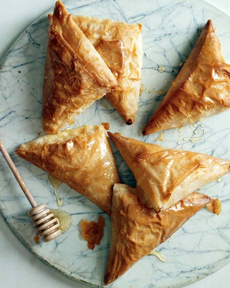 Recreating your favorite ethnic pastry at home is easy with this easy recipe -- you can even fill, shape, and freeze the turnovers for up to a month, then bake them from frozen. Honey Ricotta, Easter Food Appetizers, Impressive Appetizers, Turnover Recipes, Ricotta Recipes, Easter Brunch Food, Phyllo Dough, Egg Dish, Easter Brunch