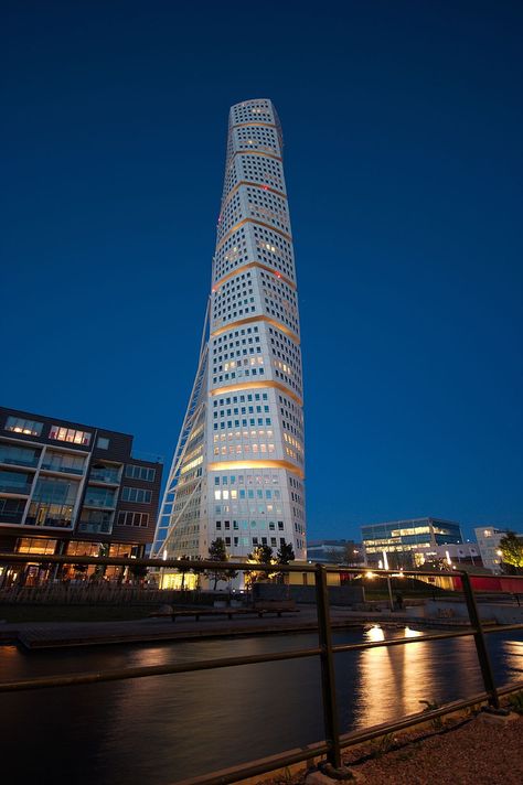 HSB Turning Torso is the tallest skyscraper in Sweden and the Nordic countries, situated in Malmö, Sweden on the Swedish side of the Öresund strait. Since completion, it is the tallest building in Scandinavia. Turning Torso, Malmo Sweden, Copenhagen Travel, Sweden Travel, Santiago Calatrava, Scandinavian Countries, Nordic Countries, Amazing Buildings, Unique Buildings