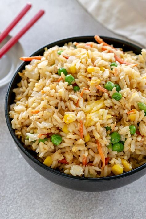 Vegetable Fried Rice is an easy weeknight side dish that can easily be made into a meal when paired with shrimp or chicken. It's the perfect way to use up leftover rice! Whether you're using brown rice or white rice, it's delicious. White Rice Calories, Takeout Fried Rice, Vegetable Fried Rice Recipe, Veggie Fried Rice, Rice Side, Fried Brown Rice, Better Than Takeout, Vegetable Fried Rice, Vegetable Rice