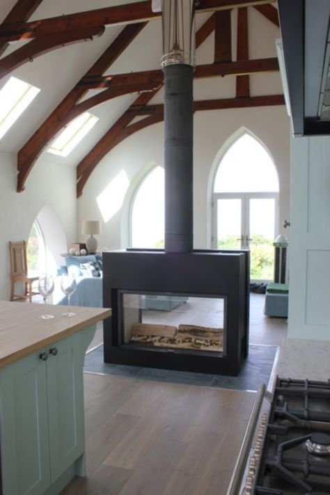 Kernow Fires Stuv 21 125 double sided bespoke fire wood burning stove installation in Cornwall. Black And Wood House Exterior, Wood Burner Fireplace, Stove Installation, Two Sided Fireplace, Wood Stove Fireplace, Fire Wood, Fireplace Logs, Double Sided Fireplace, Freestanding Fireplace