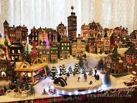 How to Build A Christmas Village Collection - The Gigi Lifestyle Victorian Christmas Village, How To Start A Christmas Village, Christmas Village Diy Accessories, Diy Christmas Village Display Ideas, Large Christmas Village Display, Snow Village Display Ideas, Christmas Village Display Ideas Layout, Ways To Display Christmas Village, Christmas Village Display Ideas