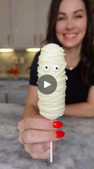 127K views · 12K reactions | Frozen Banana Mummies. Follow @chefgenevieve for 50 Halloween inspired Recipes #halloweenfood #halloweeninspo #frozenbananas #bananamummy

Frozen Banana Mummy Pops
Makes 6

Ingredients:
3 bananas, halved
12oz white coating wafers
12 candy eyeballs
6 candy sticks 

Directions: 

Peel bananas, then cut in half. Add in a candy stick through, into the cut side. Freeze on parchment paper (2-3 hours)

Melt white coating wafers according to package directions. Dip frozen bananas in, then allow to try on parchment paper.

Transfer remaining melted chocolate into a Ziploc or piping bag. Snip a small amount off the tip. Use to glue on candy eyeballs and to drizzle all over the banana (make sure not to cover the eyeballs)

Keep frozen until ready to use

Enjoy!! 👻 | Gene Banana Mummies, Candy Wafers, Candy Stick, Chocolate Covered Bananas, Candy Eyeballs, Brownie Cups, Frozen Bananas, Popcorn Bar, Piping Bag