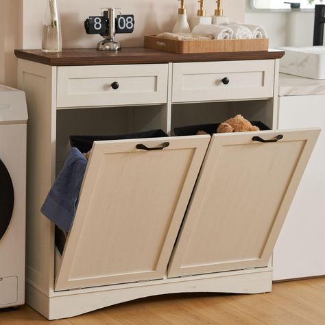 PRICES MAY VARY. High Quality: 39.76"L x 13.58"W x 38.58"H trash can cabinet (trash can not included). Made of MDF, the tilt out trash cabinet which fits up to 2 x 13 gallon trash can. You can put microwave, coffee maker or anything you want on the tabletop. Multifunctional Design: The trash cabinet is not only a practical kitchen trash can but it can also be used as the laundry basket or recycling bin, as well as a pet food bin. The drawers provide the convenient storage space for small sundries. Modern Trash Cabinet: Tilt out trash cabinet is simple and practical. It can be easily incorporated into a variety of decorating styles. It will be perfect for dressing up your kitchen, home, apartment, dorm room, etc. It also can be used as a kitchen island or suitable to store dog food, cat foo Kitchen Island With Tilt Out Trash Can, Double Tilt Out Trash Can, Island With Trash Can Storage, Trash Furniture, Ikea Trash, Kitchen Trash Can Ideas, Trash Bin Cabinet, Tilt Out Trash Cabinet, Cabinet Trash