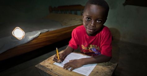 While electric light is something British children take for granted, simple things like reading always stopped as soon as night fell on African homes - until now Renewable Energy For Kids, Solar Energy For Kids, Children In Africa, Solar Kit, Electronic Engineering, Taken For Granted, Classroom Technology, Electric Lighter, Renewable Energy