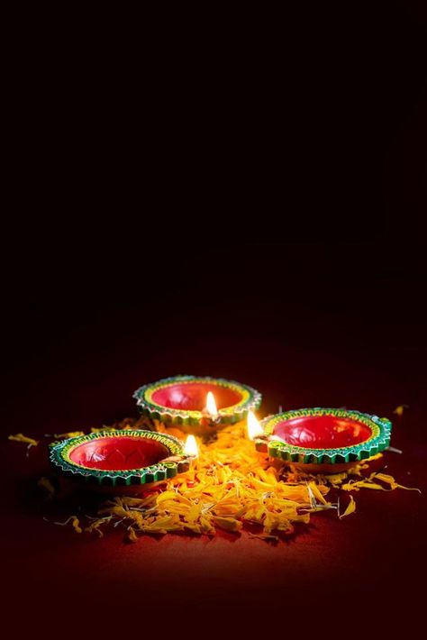 Colorful Diya lamps lit in dark room Diya Images, Colorful Diya, Tulsi Plant, Diya Lamp, Dark Room, Lamp Light, Lamps, Royalty Free Stock Photos, For Free