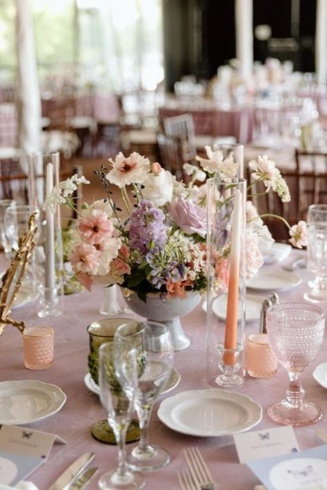 Wedding Table Setting Adorned with Pastel Florals | wedding, wedding inspo, wedding decor, wedding reception decor, wedding tablescapes, wedding table decor, wedding table ideas, wedding table centerpieces, wedding linens, linens for wedding, wedding tablecloths, linens for events, luxury linens, elegant linens, couture linens, patterned linens, elegant wedding decor, 2024 wedding, pink wedding, pink linens, velvet linens, table decorations, table ideas #weddingreception #tabledecor #linens Colored Linens Wedding Tablecloths, Round Table Setting Ideas Wedding Boho, Pink Table Runner Wedding, Pink Tablecloth Wedding, Pastel Table Setting, Spence Cabin, Linens For Wedding, Pink Wedding Table, Wedding Table Cloth